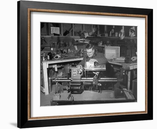 A Man Using the New "Shopsmith" a Multi-Purpose Power Tool for Carpentry Duties-null-Framed Photographic Print