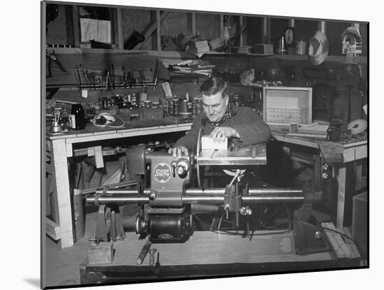 A Man Using the New "Shopsmith" a Multi-Purpose Power Tool for Carpentry Duties-null-Mounted Photographic Print