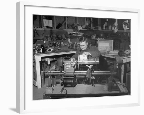 A Man Using the New "Shopsmith" a Multi-Purpose Power Tool for Carpentry Duties-null-Framed Photographic Print