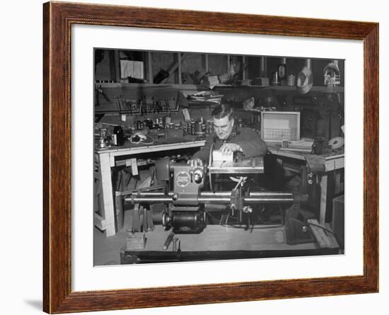 A Man Using the New "Shopsmith" a Multi-Purpose Power Tool for Carpentry Duties-null-Framed Photographic Print