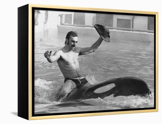 A Man with a Cowboy Hat Rides a Killer Whale-null-Framed Premier Image Canvas