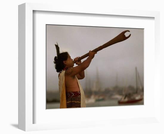 A Maori Warrior Calls Across Auckland-null-Framed Photographic Print