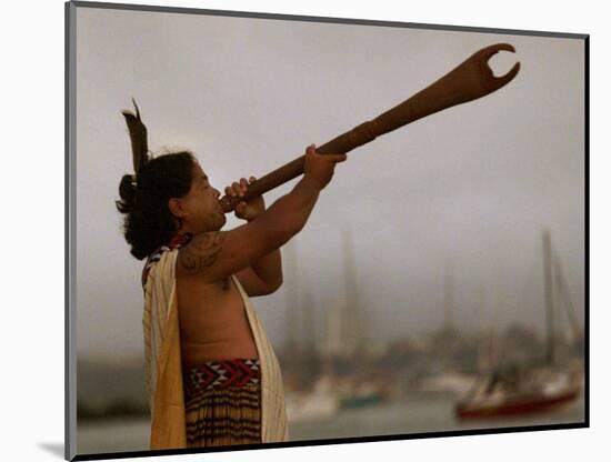 A Maori Warrior Calls Across Auckland-null-Mounted Photographic Print