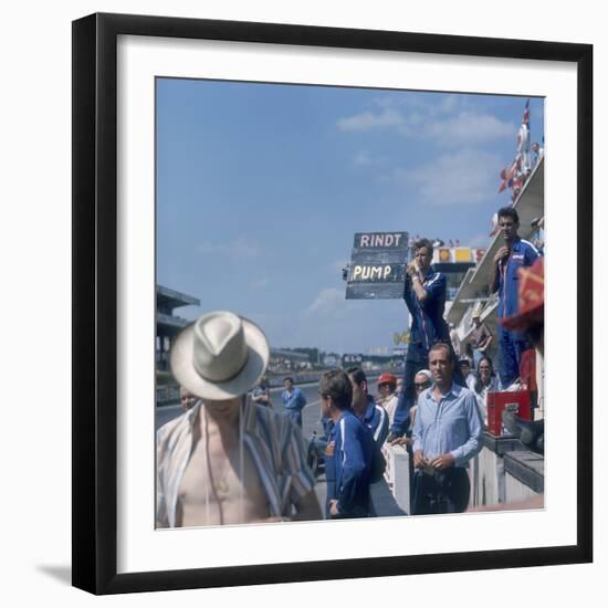 A Mechanic Holding Up a Sign, French Grand Prix, Le Mans, France, 1967-null-Framed Photographic Print