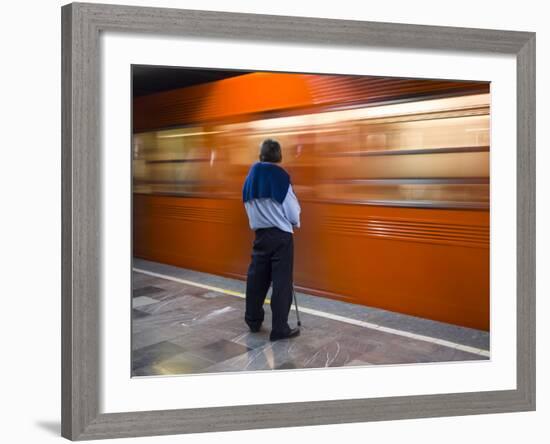 A Mexican Citizen Waits for the Metro to Stop, Mexico City, Mexico-Brent Bergherm-Framed Photographic Print