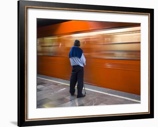 A Mexican Citizen Waits for the Metro to Stop, Mexico City, Mexico-Brent Bergherm-Framed Photographic Print