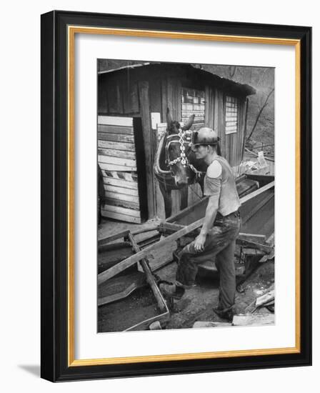 A Miner Standing with a Mule at the Rock House Coal Co. Mine-null-Framed Photographic Print