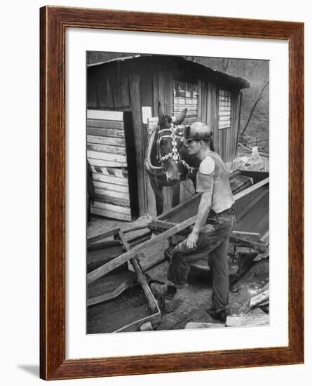 A Miner Standing with a Mule at the Rock House Coal Co. Mine-null-Framed Photographic Print