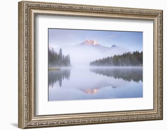 A mist shrouded Pyramid Mountain reflected in Pyramid Lake at dawn, Jasper National Park, Alberta, -Adam Burton-Framed Photographic Print