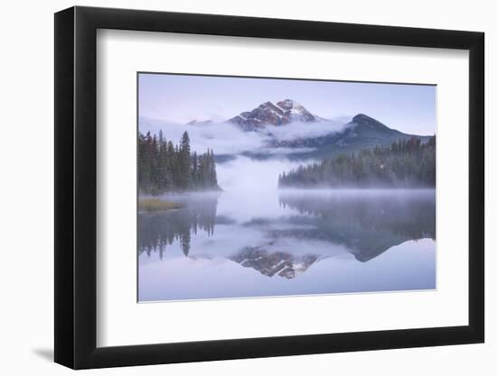 A misty Pyramid Mountain reflected in Pyramid Lake at dawn, Jasper National Park, Canadian Rockies,-Adam Burton-Framed Photographic Print