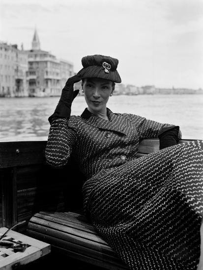 A Model Wearing Christian Dior Fashions in a Boat in Venice, 3Rd