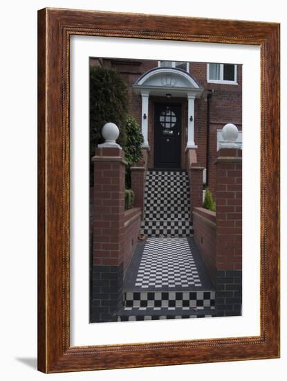 A Modern Black Front Door of a Residential House. With Black and White Stairs, and Pathway-Natalie Tepper-Framed Photo