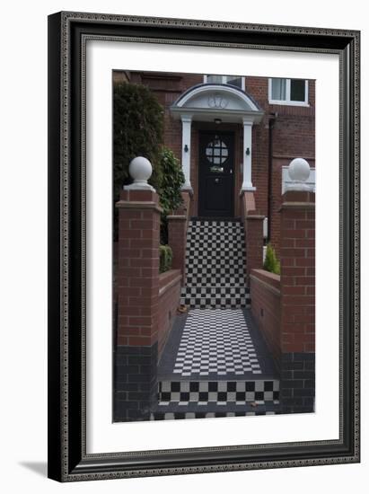 A Modern Black Front Door of a Residential House. With Black and White Stairs, and Pathway-Natalie Tepper-Framed Photo