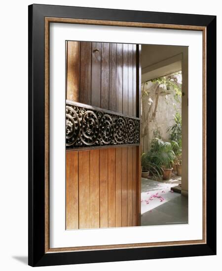 A Modern Front Door Decorated with a 400 Year Old Piece of Wood Carving-John Henry Claude Wilson-Framed Photographic Print