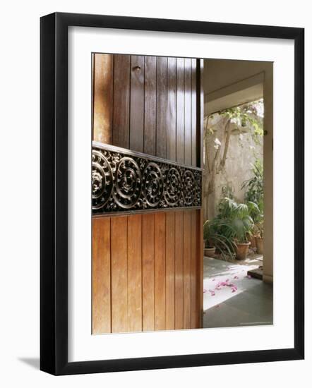 A Modern Front Door Decorated with a 400 Year Old Piece of Wood Carving-John Henry Claude Wilson-Framed Photographic Print