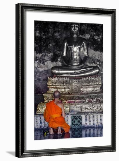 A Monk Prays in Front of a Golden Buddha, Wat Suthat, Bangkok, Thailand, Southeast Asia, Asia-Andrew Taylor-Framed Photographic Print