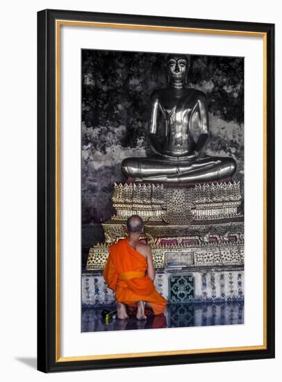 A Monk Prays in Front of a Golden Buddha, Wat Suthat, Bangkok, Thailand, Southeast Asia, Asia-Andrew Taylor-Framed Photographic Print