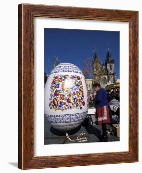 A Moravian Woman Decorating a Large Egg with Easter Designs on the Old Town Square, Prague-Richard Nebesky-Framed Photographic Print