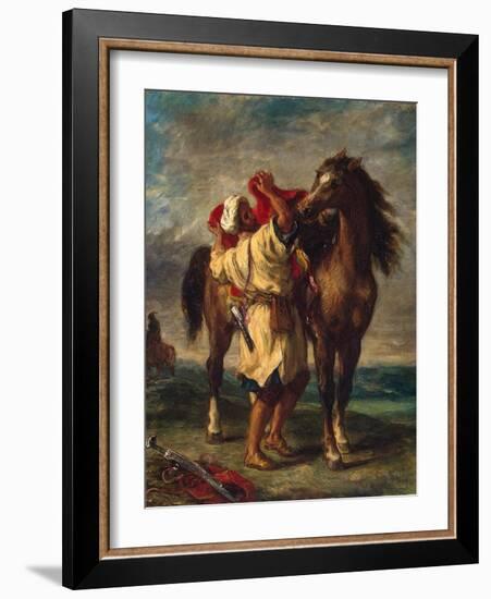 A Moroccan Saddling His Horse, 1855-Eugene Delacroix-Framed Giclee Print