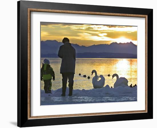 A Mother and Child Feed Water Fowl on the Ice Covered Shores of Lake Chiemsee-null-Framed Photographic Print