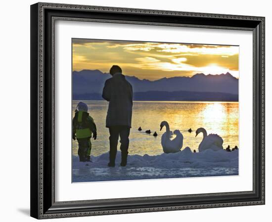 A Mother and Child Feed Water Fowl on the Ice Covered Shores of Lake Chiemsee-null-Framed Photographic Print