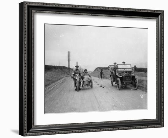 A Motorcycle and Sidecar Passing a Car and Cyclist on the Road-null-Framed Photographic Print