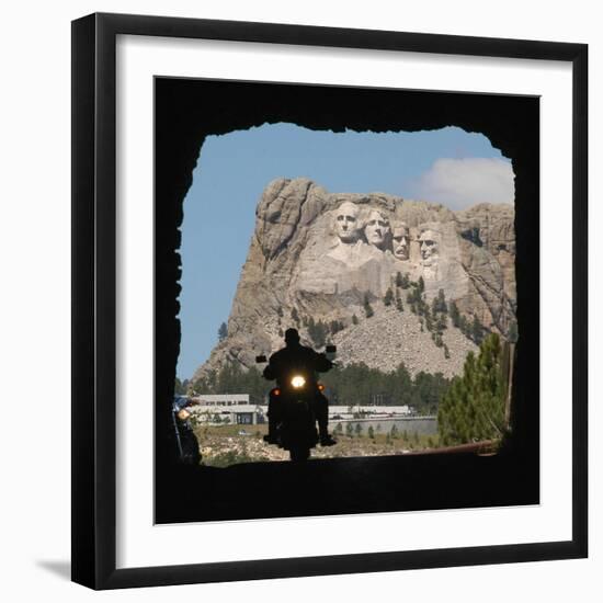 A Motorcyclist Rolls Through a Tunnel on Iron Mountain Road-null-Framed Photographic Print