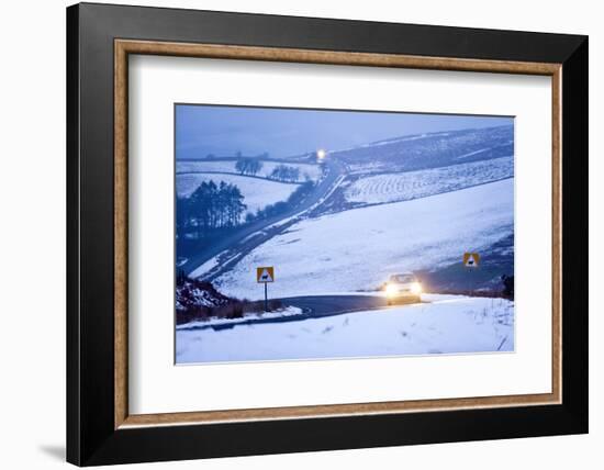 A Motorist Drives Through a Wintry Landscape on the B4520-Graham Lawrence-Framed Photographic Print