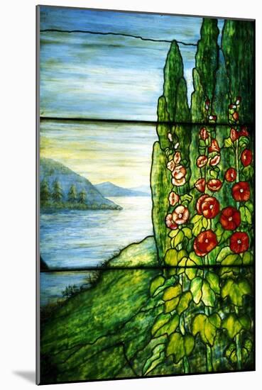 A Mountainous Lake Scene with Red Blossoming Hollyhocks and Arbor-Tiffany Studios-Mounted Giclee Print