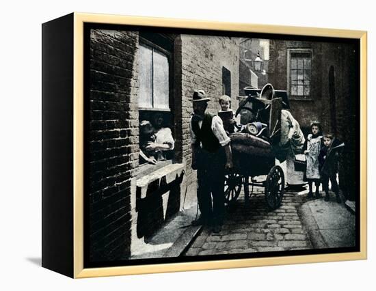 A move in 'Slumopolis', London, c1901 (1901)-Unknown-Framed Premier Image Canvas