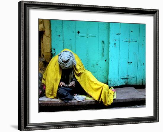 A Muslim Man Warms Himself-null-Framed Photographic Print