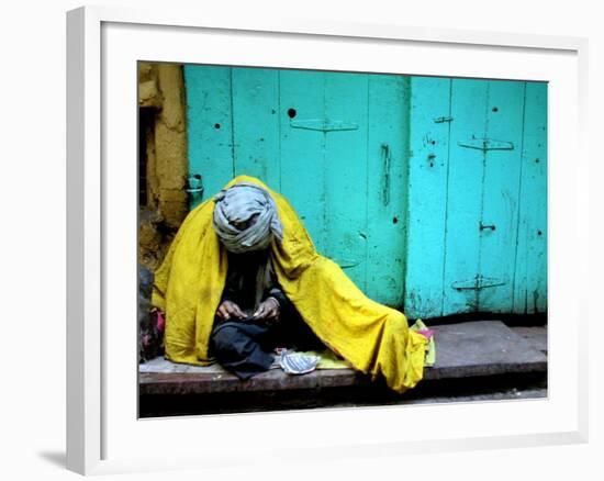 A Muslim Man Warms Himself-null-Framed Photographic Print