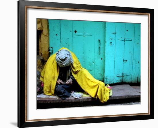 A Muslim Man Warms Himself-null-Framed Photographic Print