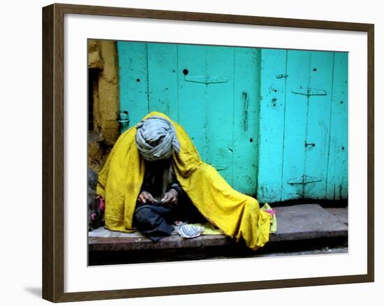 A Muslim Man Warms Himself-null-Framed Photographic Print