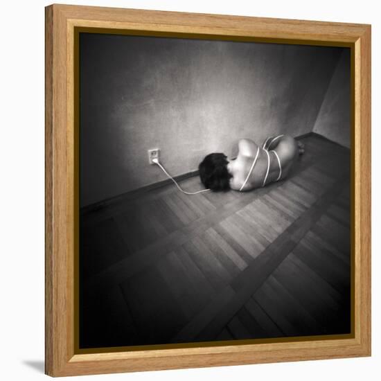 A Naked Woman Tied with Electric Flex Lying on the Floor of a Room-Rafal Bednarz-Framed Premier Image Canvas