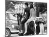 A Naked Young Women and Escort Ride a Horse Through Goose Lake Park at 3 Day Rock Music Festival-null-Mounted Photo