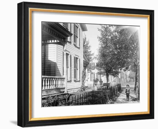 A neighbor, Daniel Henderson, in front of Wright home at 7 Hawthorn Street, Dayton, Ohio, 1897-1901-null-Framed Photographic Print