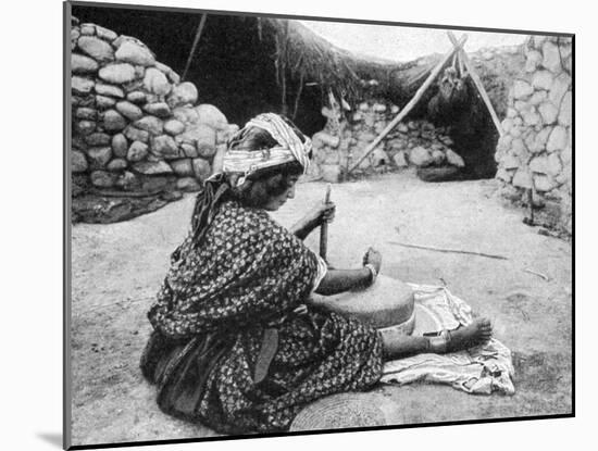 A Nomad Maid of the Mill Preparing Couscous, Algeria, 1922-A Bougaut-Mounted Giclee Print