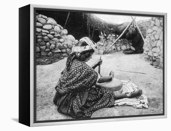 A Nomad Maid of the Mill Preparing Couscous, Algeria, 1922-A Bougaut-Framed Premier Image Canvas