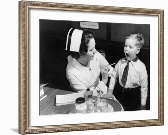 A Nurse Examining the Teeth of a Boy in New York, NY , Ca, 1935-null-Framed Photo