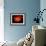 A Pair of Neutron Stars Colliding, Merging, and Forming a Black Hole-null-Framed Art Print displayed on a wall