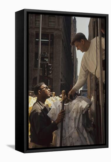 A Pair of Push Boys Unload Racks of Dresses on 7th Avenue, New York, New York, 1960-Walter Sanders-Framed Premier Image Canvas