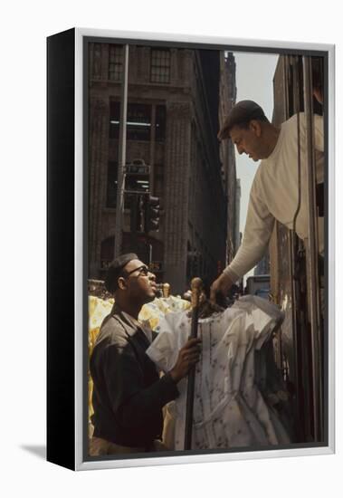 A Pair of Push Boys Unload Racks of Dresses on 7th Avenue, New York, New York, 1960-Walter Sanders-Framed Premier Image Canvas