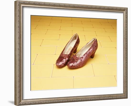 A Pair of Ruby Slippers Worn by Judy Garland in the 1939 MGM film "The Wizard of Oz"-null-Framed Giclee Print