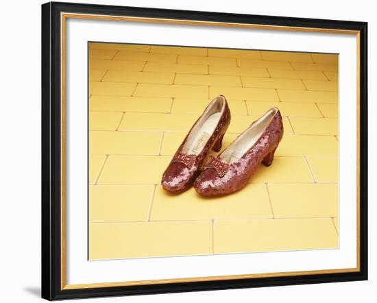 A Pair of Ruby Slippers Worn by Judy Garland in the 1939 MGM film "The Wizard of Oz"-null-Framed Giclee Print