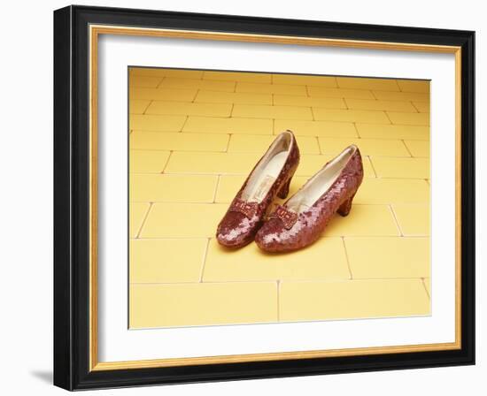 A Pair of Ruby Slippers Worn by Judy Garland in the 1939 MGM film "The Wizard of Oz"-null-Framed Giclee Print