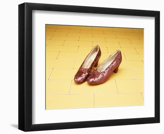 A Pair of Ruby Slippers Worn by Judy Garland in the 1939 MGM film "The Wizard of Oz"-null-Framed Premium Giclee Print