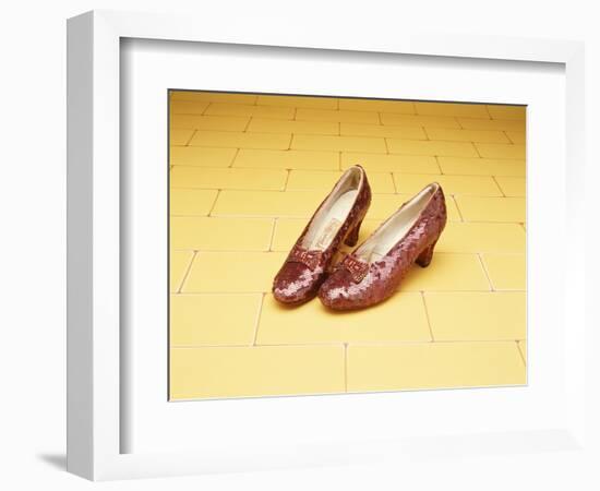 A Pair of Ruby Slippers Worn by Judy Garland in the 1939 MGM film "The Wizard of Oz"-null-Framed Premium Giclee Print