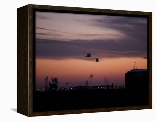 A Pair of UH-60 Black Hawk Helicopters Approach their Landing in Baghdad, Iraq-null-Framed Premier Image Canvas