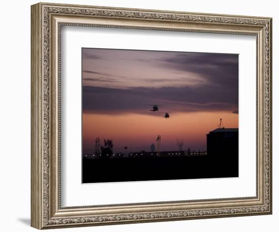 A Pair of UH-60 Black Hawk Helicopters Approach their Landing in Baghdad, Iraq-null-Framed Photographic Print